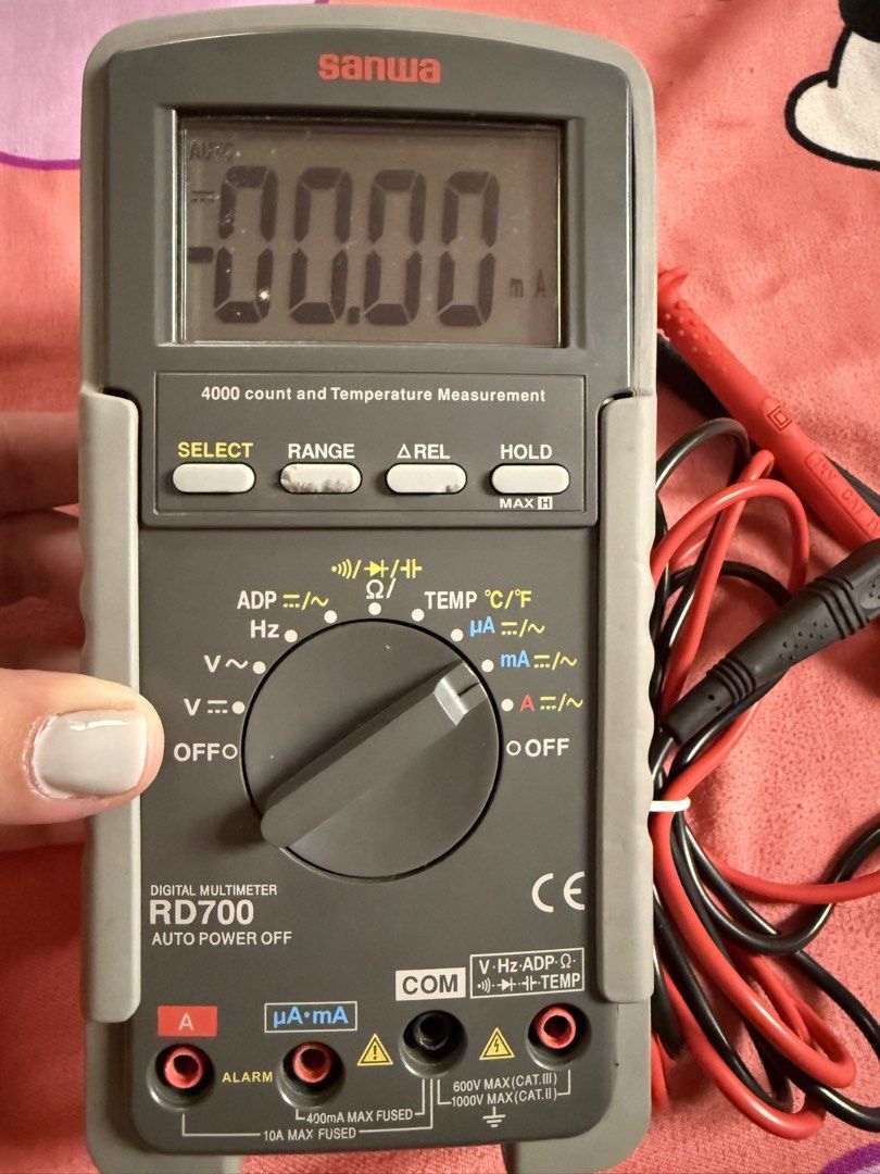 Sanwa RD700 Digital Multimeter with Test Leads (Category: Construction Tools & Equipment) located in Caloocan City. Submitted by nethbo (Listing ID 1467376238, Image 2). Description: - Model: Sanwa RD700 Digital Multimeter - Condition: Fully functional, clean battery compartment and clear display - Features: Auto power off and temperature measurement up to 4000 counts - Testing Modes: Voltage, current, resistance, and frequency - Inclusions: Orig
