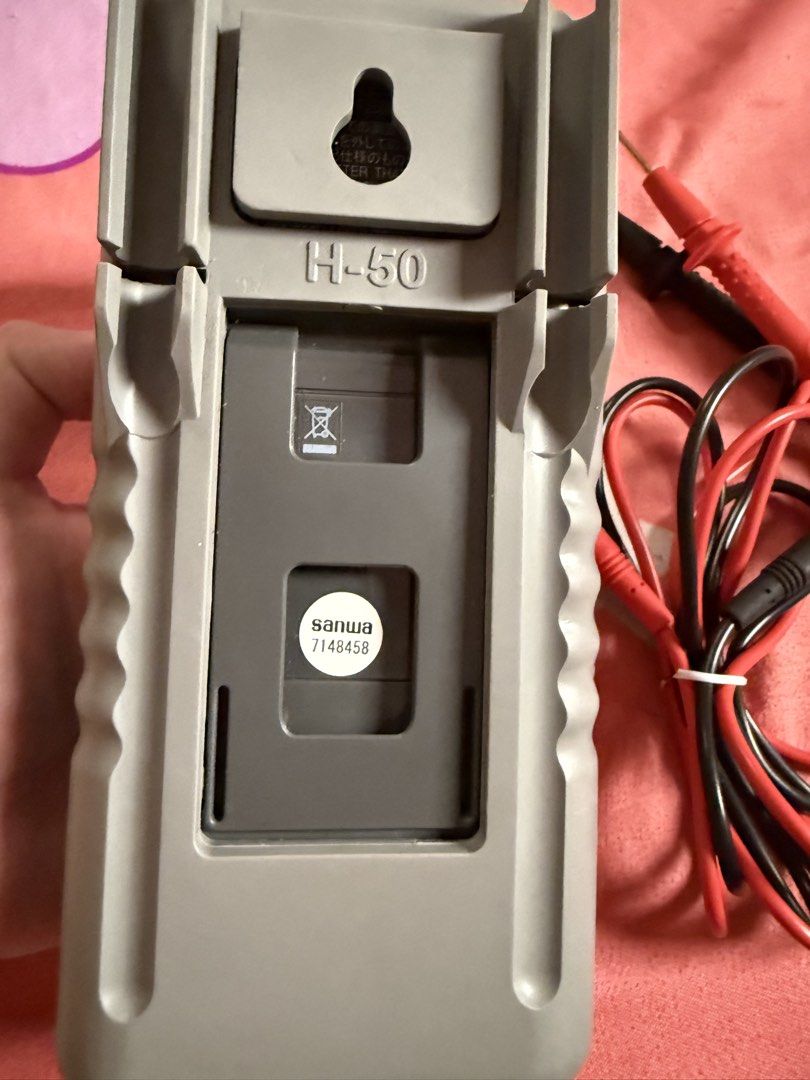 Sanwa RD700 Digital Multimeter with Test Leads (Category: Construction Tools & Equipment) located in Caloocan City. Submitted by nethbo (Listing ID 1467376238, Image 3). Description: - Model: Sanwa RD700 Digital Multimeter - Condition: Fully functional, clean battery compartment and clear display - Features: Auto power off and temperature measurement up to 4000 counts - Testing Modes: Voltage, current, resistance, and frequency - Inclusions: Orig