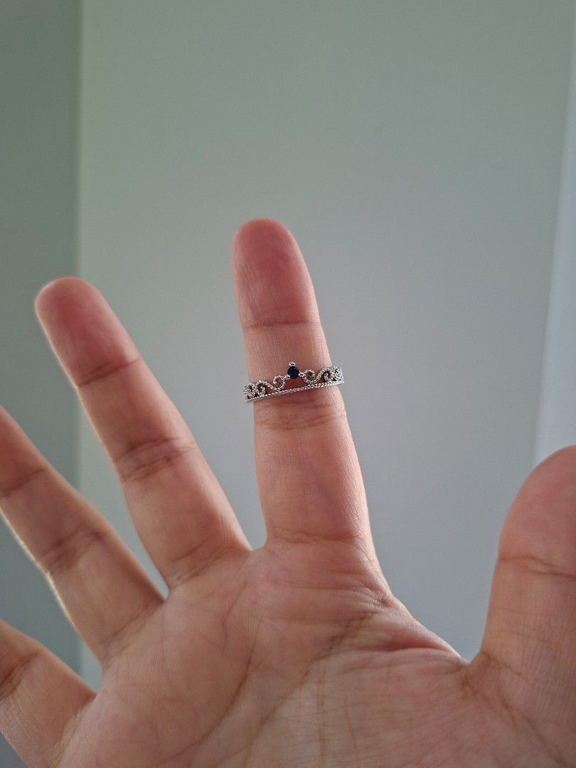 Sapphire Blue Simple Crown Ring Size 8 (Category: Rings) located in Dasmarinas. Submitted by danabrie22 (Listing ID 1467371090, Image 2). Description: size 7 very well-made, excellent crafstmanship 10/10 condition brand new stainless steel & colored cubic zirconia stones made in Hongkong.