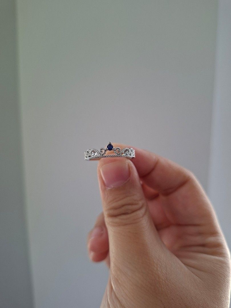 Sapphire Blue Simple Crown Ring Size 8 (Category: Rings) located in Dasmarinas. Submitted by danabrie22 (Listing ID 1467371090, Image 1). Description: size 7 very well-made, excellent crafstmanship 10/10 condition brand new stainless steel & colored cubic zirconia stones made in Hongkong.