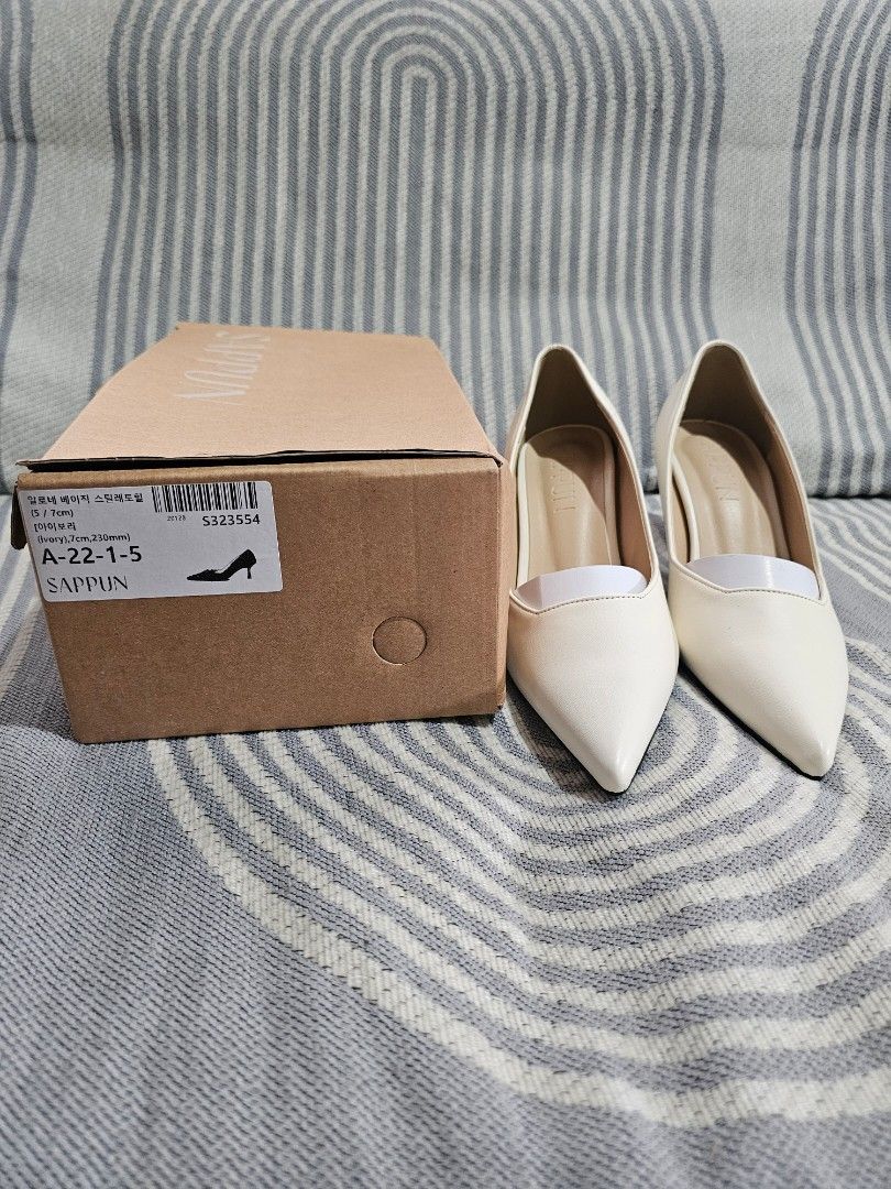 SAPPUN Ivory Pointed Toe Kitten Heels Size 230 (Category: Heels) located in San Mateo. Submitted by reyshel08 (Listing ID 1467379025, Image 2). Description: - Brand: SAPPUN - Style: Pointed toe heels with sleek curved collar line - Color: Ivory - Size: 230mm - Heel Height: 7cm - Condition: Worn once for a quick event, basically untouched / like new - Inclusion: Original shoebox included.