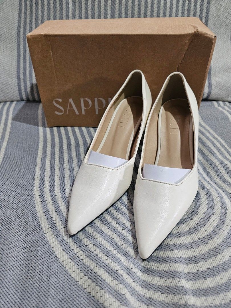 SAPPUN Ivory Pointed Toe Kitten Heels Size 230 (Category: Heels) located in San Mateo. Submitted by reyshel08 (Listing ID 1467379025, Image 3). Description: - Brand: SAPPUN - Style: Pointed toe heels with sleek curved collar line - Color: Ivory - Size: 230mm - Heel Height: 7cm - Condition: Worn once for a quick event, basically untouched / like new - Inclusion: Original shoebox included.
