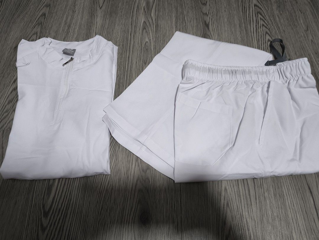 Scrubsuit (Category: Sets or Coordinates) located in Manila. Submitted by marjdv29 (Listing ID 1467532924, Image 3). Description: - Brand: Viaoli - Color: Light Purple - Size: S - Style: V-neck top with pocket and matching jogger pants - Condition: Brand new, never worn out, tags detached - Perfect fit for daily duty or school! white XS.