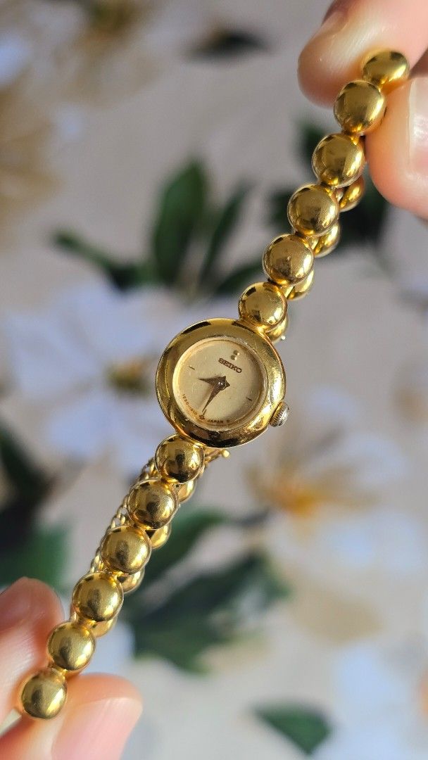 Seiko Bubbles (Category: Women's Watches) located in Silang. Submitted by thewornhour (Listing ID 1467480693, Image 1). Description: Vintage 1986 Seiko Quartz Dress Watch – Gold Ball-Link Chain Bracelet Accent ✔ All original watch ✔ Case: 10.6mm including crown ✔ Up to 16cm ✔ Movement: Seiko Japan Analogue Quartz ✔ Condition: An absolute stunner from Seiko's premium vintage era. There are minimal hairline scratches on the glass and some gold fadi