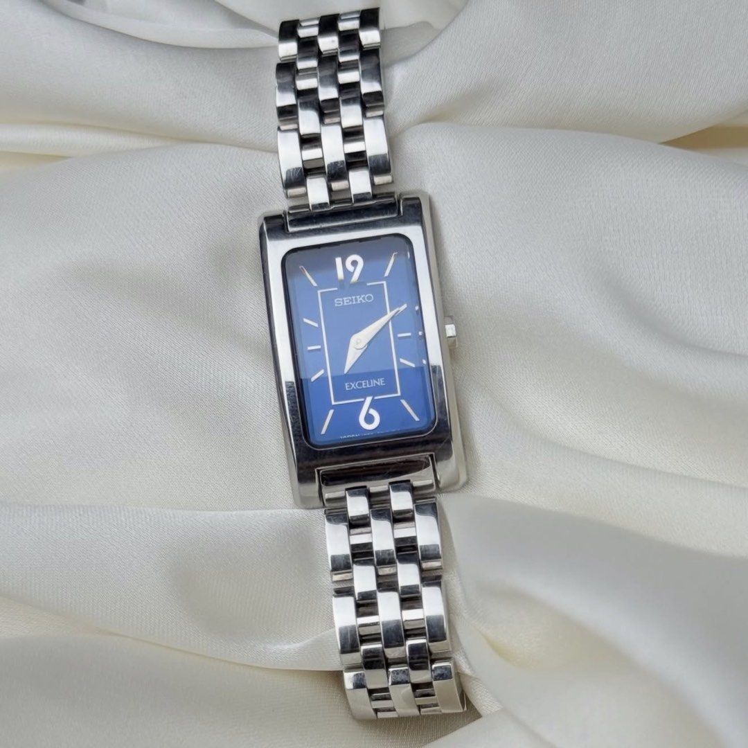 Seiko Exceline Tank Watch Blue Dial (Category: Women's Watches) located in Lipa City. Submitted by watchoutph (Listing ID 1467549839, Image 3). Description: Seiko Exceline Mini Tank Blue Deep Royal Blue Dial (Gradient) Checkered Silver hands and indices Unbuffed 30x17mm 16.5cm wrist size ₱9,800.
