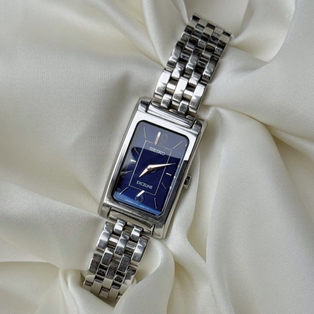 Seiko Exceline Tank Watch Blue Dial (Category: Women's Watches) located in Lipa City. Submitted by watchoutph (Listing ID 1467549839, Image 2). Description: Seiko Exceline Mini Tank Blue Deep Royal Blue Dial (Gradient) Checkered Silver hands and indices Unbuffed 30x17mm 16.5cm wrist size ₱9,800.