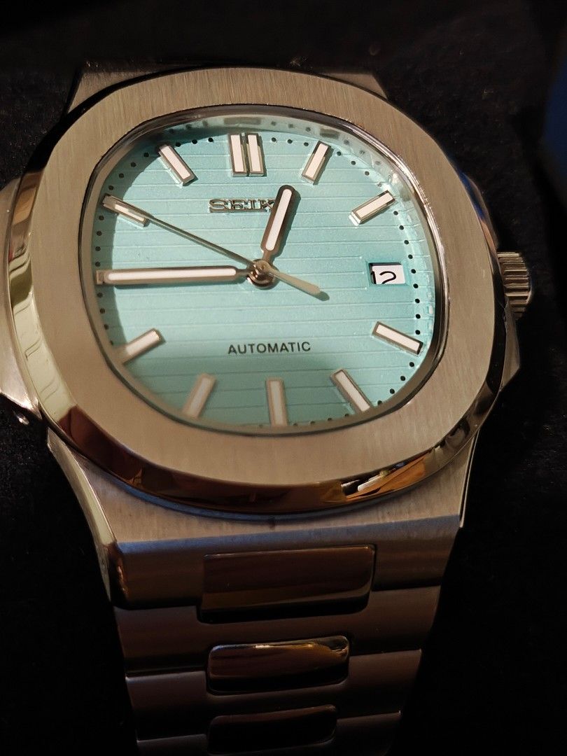 Seiko Mod Nautilus Tiffany Dial Automatic Watch (Category: Men's Watches) located in Batangas. Submitted by cvllanda (Listing ID 1467470639, Image 2). Description: - NH35A Movement - Sapphire Crystal - Tiffany Dial - Solid Stainless Steel Meet-up: Bataan Shipping: via J&T (shouldered by buyer) Payment First.