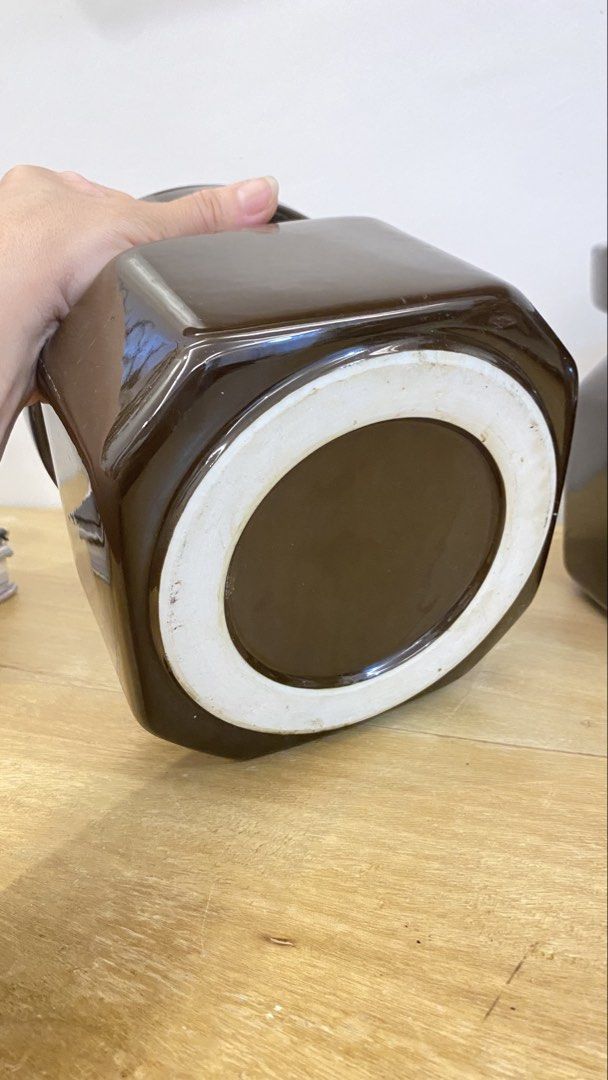 Set of two brown ceramic storage jars (Category: Vases & Decorative Bowls) located in Manila. Submitted by pinklilo (Listing ID 1467450219, Image 3). Description: ceramic jars.