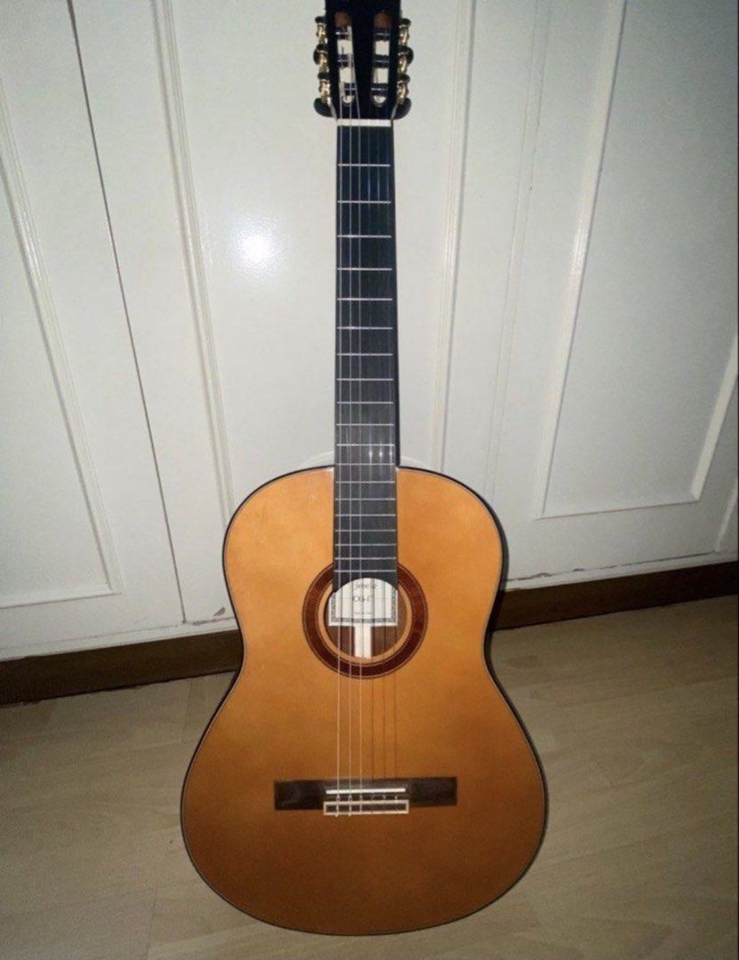 Severo CG-1T Classical Guitar (Category: Musical Instruments) located in Angeles City. Submitted by closetby3girls (Listing ID 1467397720, Image 1). Description: - Model: Severo CG-1T classical guitar - Strings: Nylon strings with a clean fretboard and top wood - Design: Traditional rosette soundhole and black headstock with gold tuners - Included: Padded brown gig bag with Severo logo - Ideal for: Students and casual players looking for a reliab