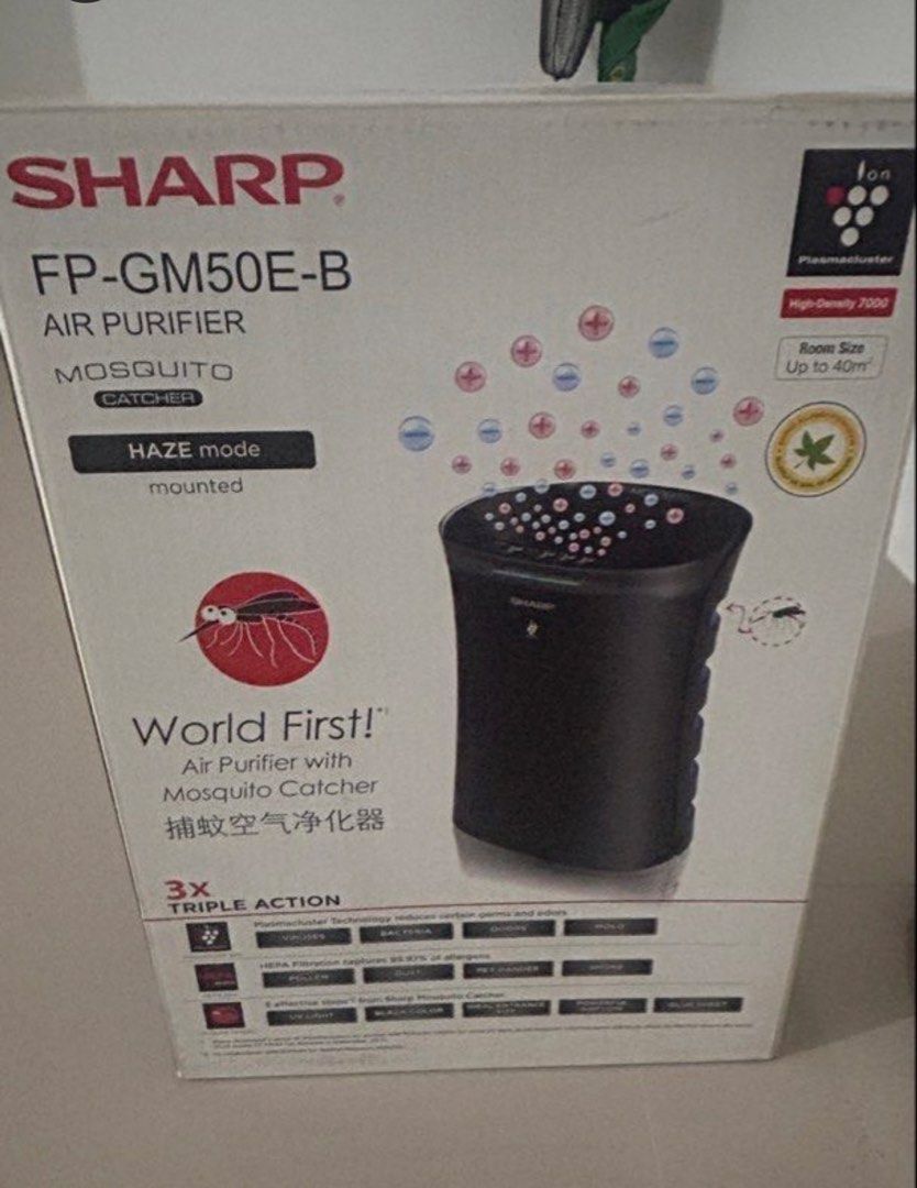 Sharp FP-GM50E-B Air Purifier with Mosquito Catcher (Category: Air Purifiers & Dehumidifiers) located in Quezon City. Submitted by pre.loved_items (Listing ID 1467384677, Image 3). Description: - Model: Sharp FP-GM50E-B Air Purifier & Mosquito Catcher (Black) - Condition: Brand new, unopened, still in original retail box - Coverage: Ideal for rooms up to 40 square meters - Features: Triple-action filtration (dust, pollen, pet dander, odors) + Pla