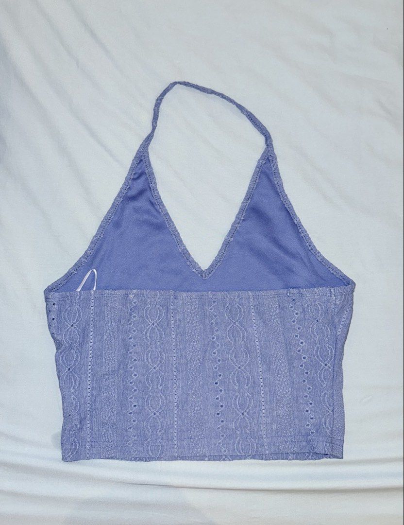 SHEIN Blue Halter Crop Top (Category: Sleeveless) located in Las Pinas. Submitted by kathhsantoss (Listing ID 1467463601, Image 3). Description: - Used only once - Measurements: Bust - 30.7in Length - 18.1in - Material & Design: Textured cable knit with vertical cutout details and V-neckline - Style: Open back with thin halter neck strap .