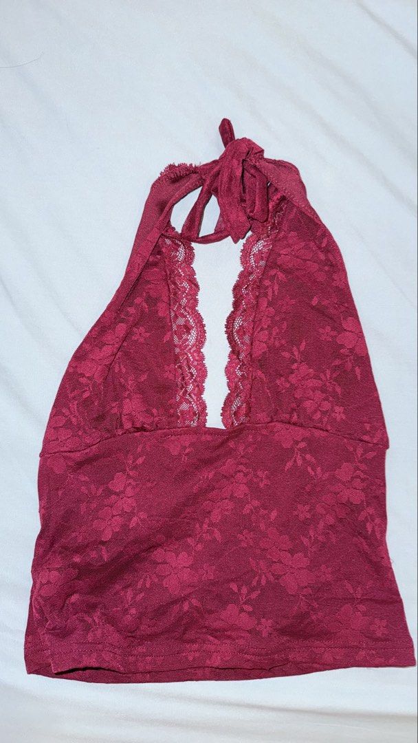 SHEIN Burgundy Lace Halter Top (Category: Sleeveless) located in Las Pinas. Submitted by kathhsantoss (Listing ID 1467498622, Image 1). Description: - Used only once - Measurements: Bust - 34.6in Waist - 24.8in Length - 18.5in - Material: 100% lightweight polyester - Design: Deep V-neckline with all-over floral lace trim, open back, and adjustable tie neck closure .