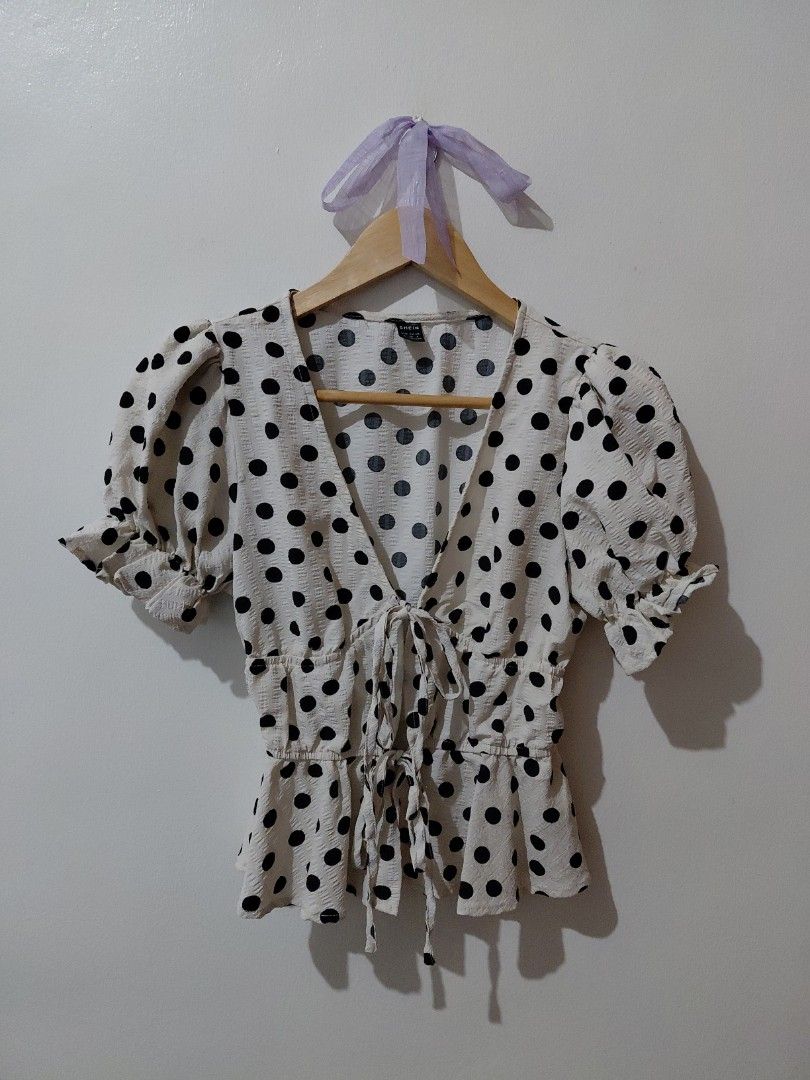 Shein Front Tie Ribbon Puff Sleeves Top (Category: Blouses) located in Tarlac. Submitted by wornwardrobe (Listing ID 1467475893, Image 1). Description: Kindly note that all items are stored at my parents' house and not on hand. Retrieval takes up to 2 weeks before shipping. Please purchase only if you're okay with the wait. Message me to check the next available shipping date! Thank you!.