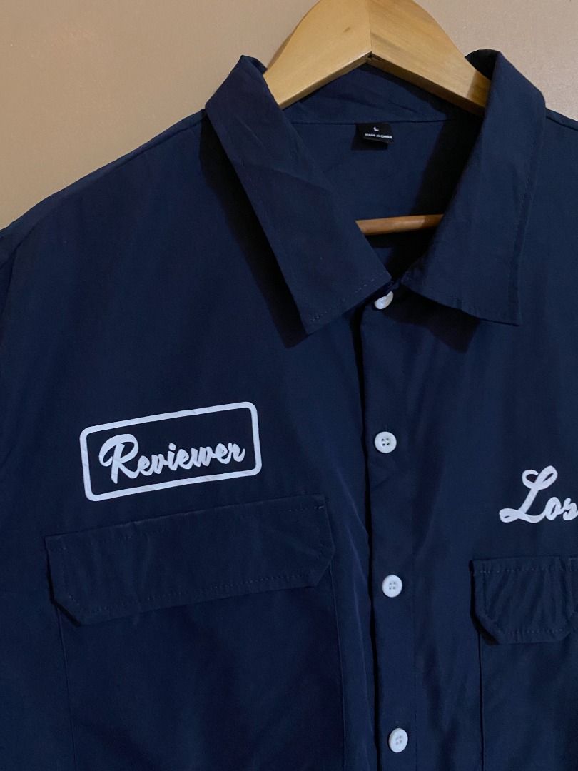 SHEIN Navy Button Up Multi Pocket Polo (Category: Tshirts & Polo Shirts ) located in Cadiz. Submitted by thespotcdz (Listing ID 1467399032, Image 3). Description: Fits XL Width 23.5" Length 30" Good as new.