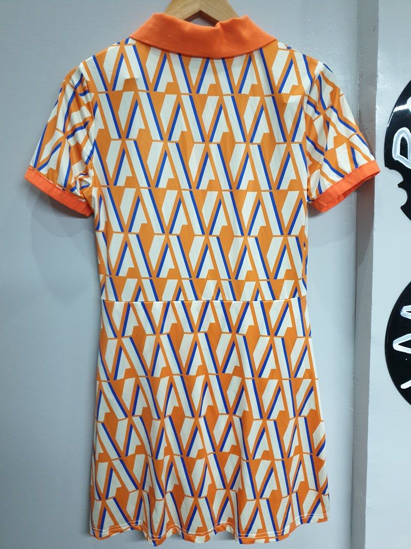 SHEIN orange mini dress retro style (Category: Dresses) located in Calamba. Submitted by mimabuy (Listing ID 1467408531, Image 3). Description: Never worn Best fit for medium to large Fabric is very stretchy .