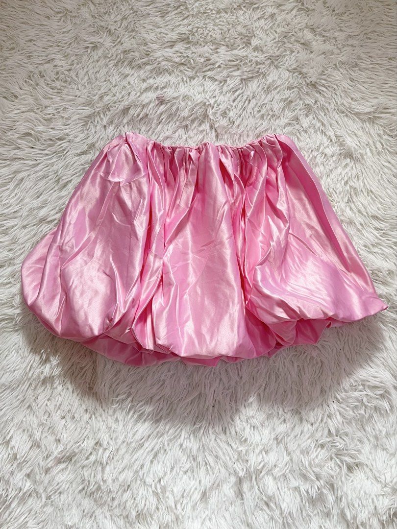 SHEIN Pink Satin Bubble Skirt Size S (Category: Skirts) located in Manila. Submitted by serendipity.findss (Listing ID 1467435017, Image 2). Description: - Brand/Style: SHEIN bright pink satin bubble skirt - Size: Small (US 4, EU 36) - Material: 100% smooth polyester satin - Fit: Comfortable elastic waistband with a puffy, voluminous silhouette - Versatility: Perfect for festivals, parties, and trendy streetwear looks - Condition: Excellent/Brand