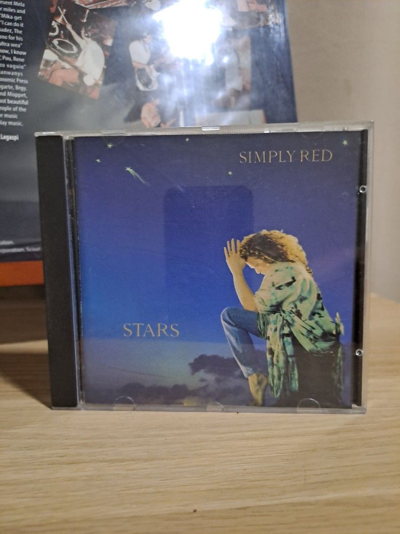 Simply Red Stars CD Album (Category: CDs & DVDs) located in Las Pinas. Submitted by cobieshop (Listing ID 1467506563, Image 1). Description: - Artist: Simply Red - Album: Stars (Studio Album) - Format: Audio CD in standard jewel case - Label: Warner Music - Catalog Number: 9031-75284-2 - Tracklist: Something Got Me Started, Stars, Thrill Me, Your Mirror, She's Got It Bad, For Your Babies, Model, How Could I Fall, Freedom, Wonderland - Condition: 