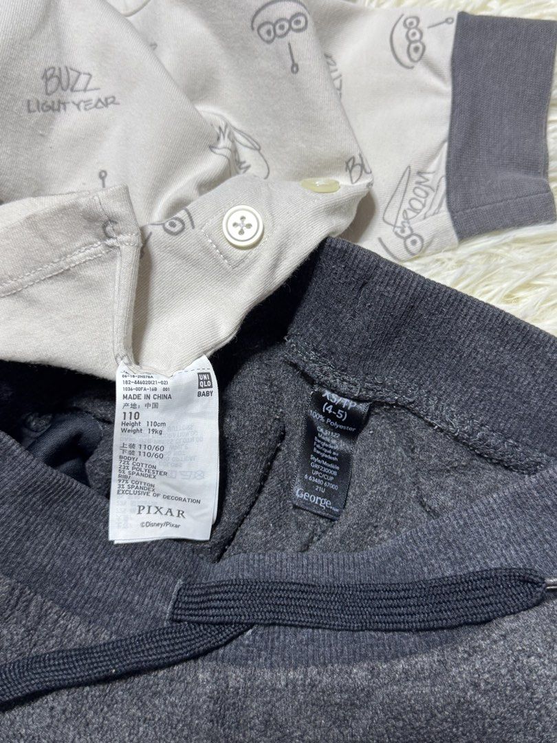 sleepwear kids (Category: Babies & Kids Fashion) located in Dagupan City. Submitted by iamrannflores (Listing ID 1467419645, Image 2). Description: - Set includes: Uniqlo Disney Pixar Toy Story top and George grey fleece joggers - Top: Size 110 (fits height 110cm, weight 19kg), cotton-polyester blend, features all-over print and Woody & Buzz pocket patch - Joggers: Size XS/TP (4-5 years), 100% polyester fleece with an adjustable drawstring waist 