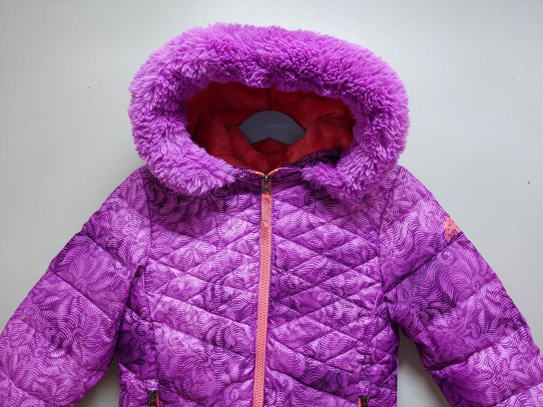 Snozu Fleece Lined Puffer Jacket Size 5T (Category: Babies & Kids Fashion) located in Dagupan City. Submitted by upforgrabs2400 (Listing ID 1467524799, Image 2). Description: Snozu Fleece Lined Puffer Jacket - Size: 5T (Shoulders: 14", Chest: 16", Length: 19") - Design: Purple pattern with a vibrant coral lining and cozy faux fur hood trim - Warmth: Down and waterfowl feather fill for ultimate cold-weather protection - Storage: Two convenient fro