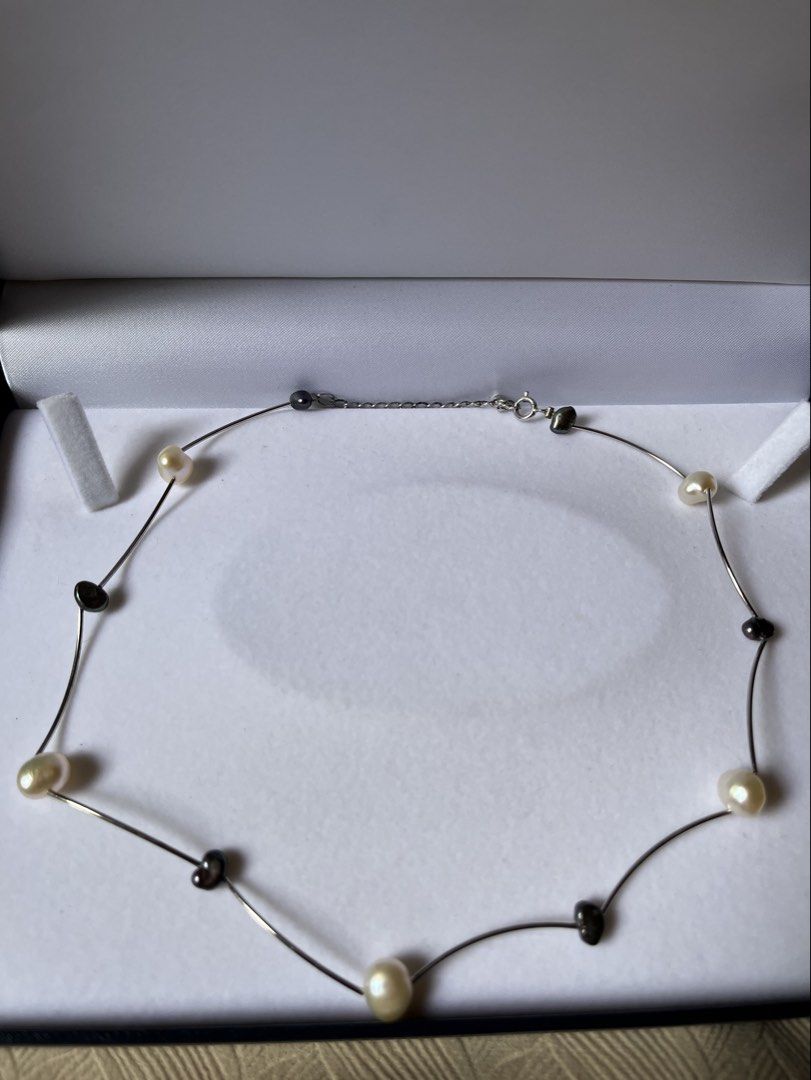 SOLID STERLING Pearl and Black Bead Necklace Silver Tone (Category: Necklaces) located in Tandag. Submitted by maryarlale42144 (Listing ID 1467369745, Image 1). Description: SOLID STERLING WITH REAL PEARL BLACK AND WHITE.