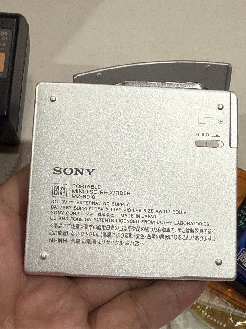 Sony MZ-R910 MD Walkman (Category: Portable Music Players) located in Makati City. Submitted by see5o5 (Listing ID 1467456450, Image 3). Description: Sony MZ-R910 Recording Minidisc Walkman (Silver) Tested and fully working. Just some tiny scratches and some chrome chipped off near the eject button. Includes: Charging dock, AC power adaptor (110v), original Sony rechargeable battery 5 free Minidiscs Condition as described but since this is over 2