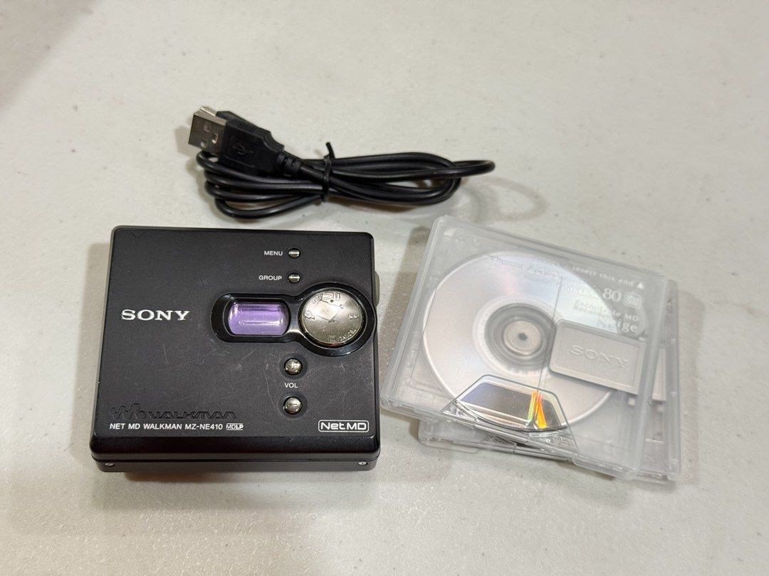 Sony NetMD Walkman MZ-NE410 Minidisc (Category: Portable Music Players) located in Makati City. Submitted by see5o5 (Listing ID 1467460652, Image 1). Description: Sony MZ-NE410 NetMD Minidisc Walkman (Black) All working, minor scuffs from regular handling. NetMD allows you to transfer music using your computer from MP3’s and other music files with full track titles. You can also add titles to existing MDs or do automatic song recognition to label