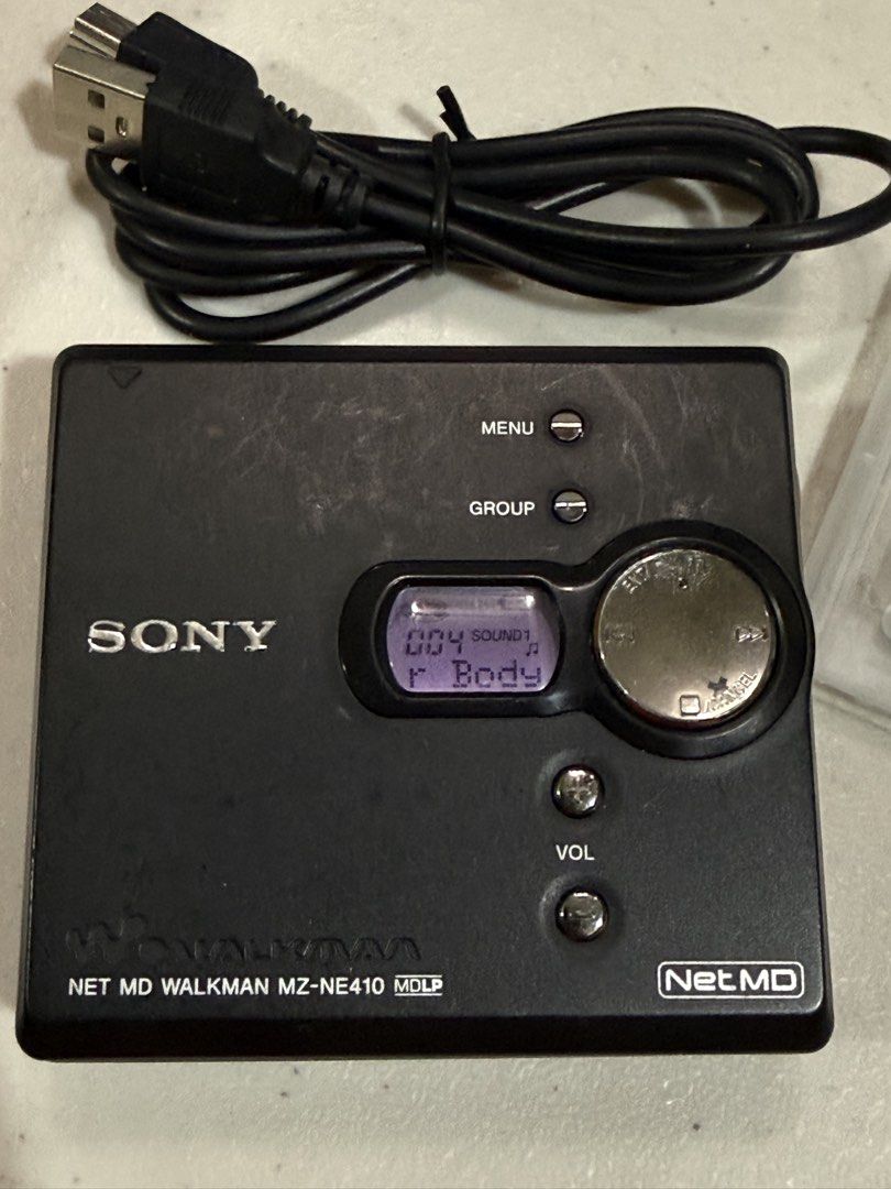 Sony NetMD Walkman MZ-NE410 Minidisc (Category: Portable Music Players) located in Makati City. Submitted by see5o5 (Listing ID 1467460652, Image 2). Description: Sony MZ-NE410 NetMD Minidisc Walkman (Black) All working, minor scuffs from regular handling. NetMD allows you to transfer music using your computer from MP3’s and other music files with full track titles. You can also add titles to existing MDs or do automatic song recognition to label