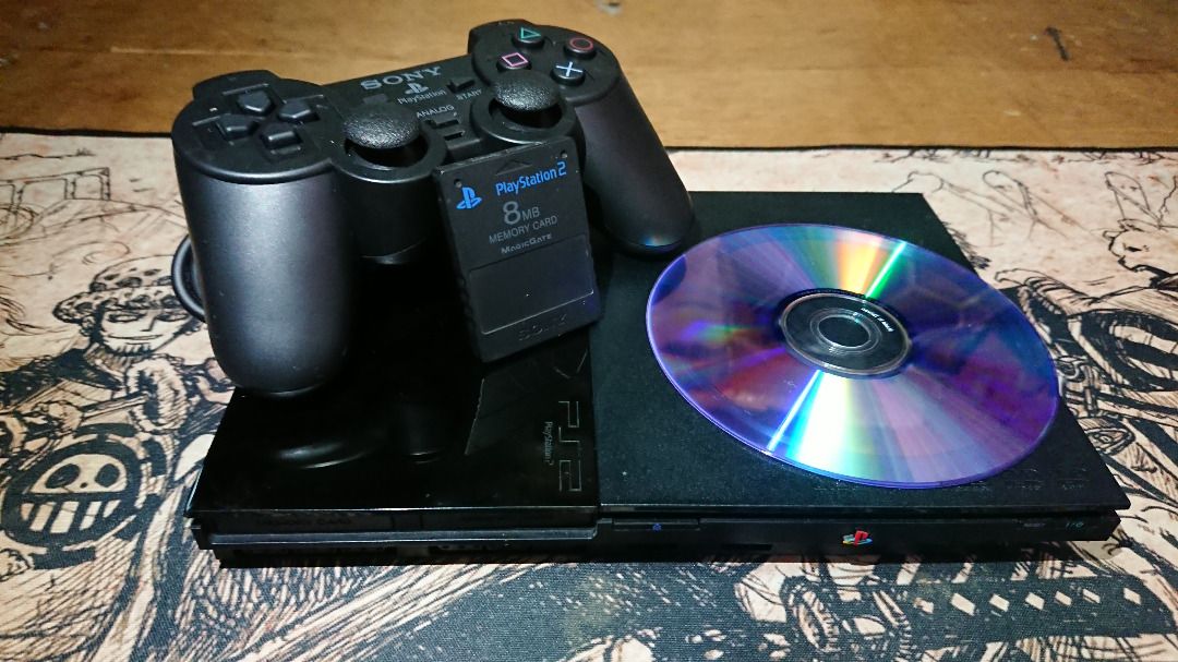 Sony PlayStation 2 Slim Console (Category: PlayStation) located in La Trinidad. Submitted by raffy_8810 (Listing ID 1467509168, Image 1). Description: PlayStation 2 Slim Model No.: SCPH-90004 Region: PAL-Europe Accessories: * PS2 AV cable * Power cord (uses a Europlug type; needs an adapter) * Network cable * 1 - DualShock 2 Controller with vibration * 1 - 8MB Magic Gate Memory card Include: * 1 - Burned backup copy game disc (DVD-R, Midnight Clu