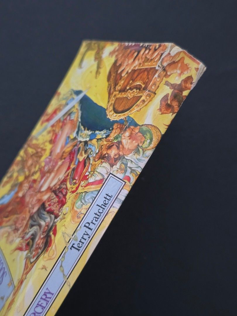 Sourcery by Terry Pratchett (Mass Market Paperback) (Category: Storybooks) located in Dasmarinas. Submitted by curatedreadsbykat (Listing ID 1467377017, Image 3). Description: ✨ Secondhand ✨ This is a preloved copy so kindly manage your expectations. May have flaws like dents, tanning, foxing, writings, etc. ✨ Kindly swipe left on the picture section of the listing to see the condition of the book..