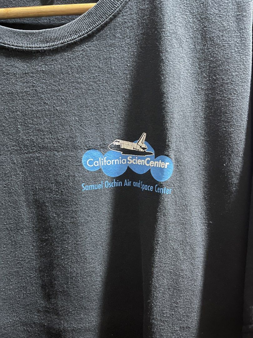 Space Shuttle Endeavour (Category: Tshirts & Polo Shirts ) located in San Simon. Submitted by t3_thrifts (Listing ID 1467571564, Image 2). Description: This t-shirt features a graphic of the Space Shuttle Endeavour with “California Science Center” and “Samuel Oschin Air and Space Center” lettering on the back. Dimensions: 23W x 29L Issue/s: Lints Good fade Crack prints Price: 1,000 Courier: J&T, Lalamove, LBC Seller location: Apalit Pampanga.