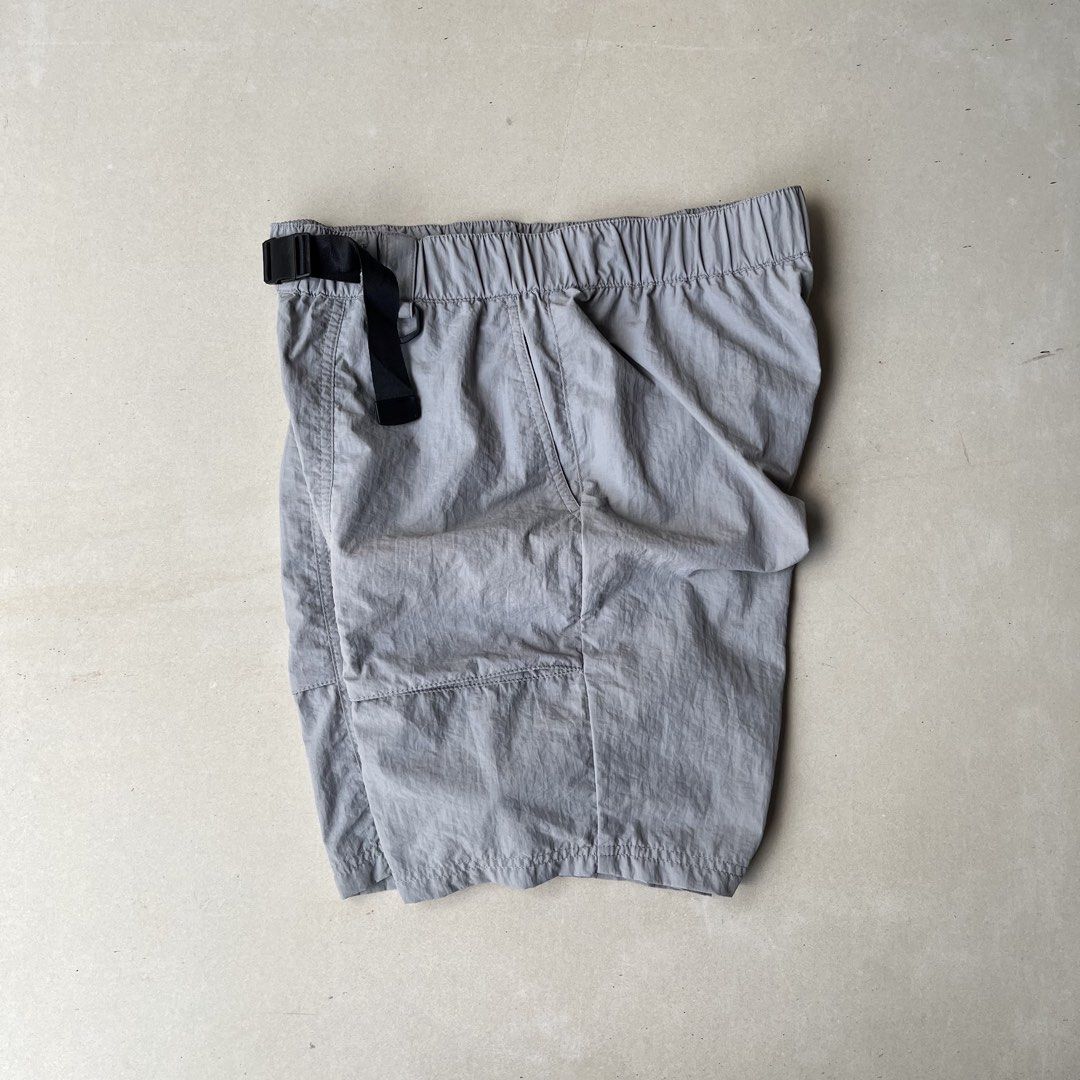 SPAO Grey Nylon Cargo Shorts (Category: Shorts) located in Mandaue City. Submitted by chinsyap_03 (Listing ID 1467488124, Image 2). Description: - Brand: SPAO - Color: Grey - Condition: Excellent - Material: Lightweight nylon - Features: Elastic waistband with built-in adjustable buckle belt, multiple front cargo pockets, one back pocket - Waistline: 30 to 34 inches - Length: 19 inches - Leg Opening: 11 inches - Ideal for: Casual wear and outdoor