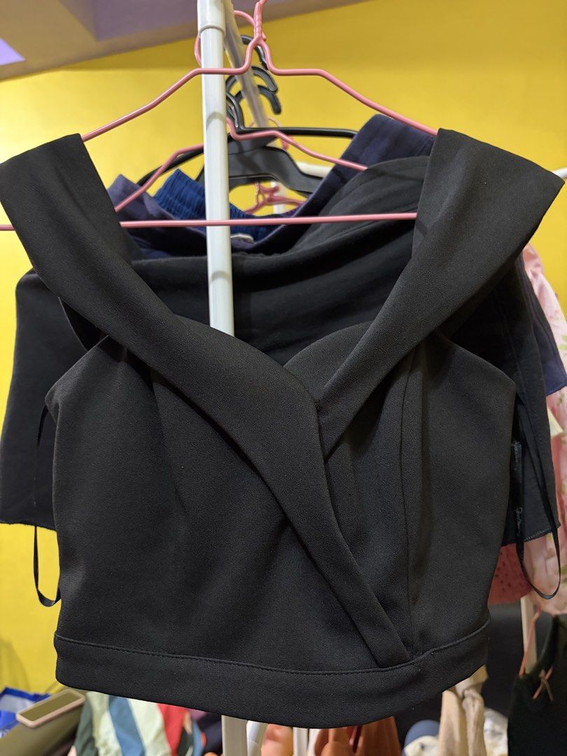 Speechless Black Off-Shoulder Crop Top Size 1 (Category: Blouses) located in Calamba. Submitted by handpickedbynetty (Listing ID 1467386213, Image 1). Description: - Brand: Speechless - Color: Black - Style: Off-shoulder crop top with crossover front straps - Closure: Back zipper - Size: 1 (Tag attached) - Origin: Made in Vietnam - Padded.
