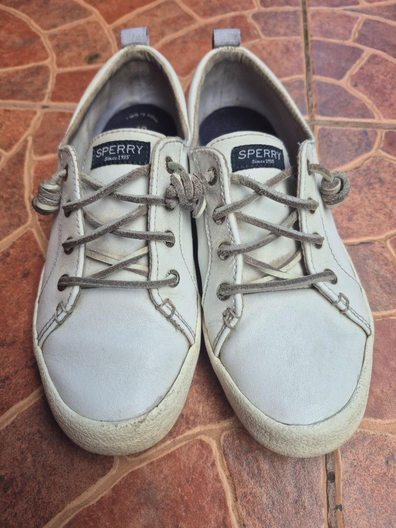 Sperry White Casual Sneakers Size US 7 (Category: Sneakers) located in Caloocan City. Submitted by munchie787906 (Listing ID 1467519641, Image 3). Description: - Brand: Sperry - Model: STS82371 - Color: Off-white leather with grey laces - Size: US 7 / UK 4.5 / EUR 37.5 / CM 24 - Style: Low-top casual sneakers with lace-up front - Soles: Rubber textured outsoles - Condition: Comfortable everyday wear with minor wear on soles and uppers Baguio loc.