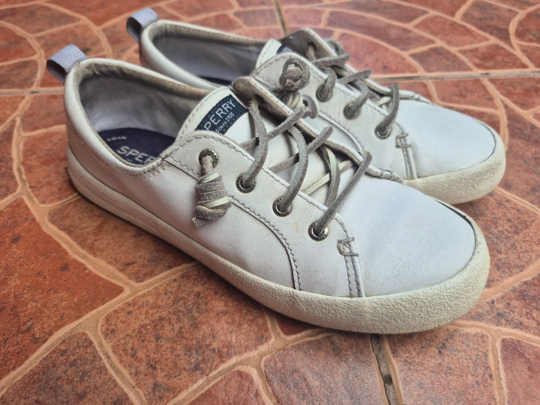Sperry White Casual Sneakers Size US 7 (Category: Sneakers) located in Caloocan City. Submitted by munchie787906 (Listing ID 1467519641, Image 1). Description: - Brand: Sperry - Model: STS82371 - Color: Off-white leather with grey laces - Size: US 7 / UK 4.5 / EUR 37.5 / CM 24 - Style: Low-top casual sneakers with lace-up front - Soles: Rubber textured outsoles - Condition: Comfortable everyday wear with minor wear on soles and uppers Baguio loc.