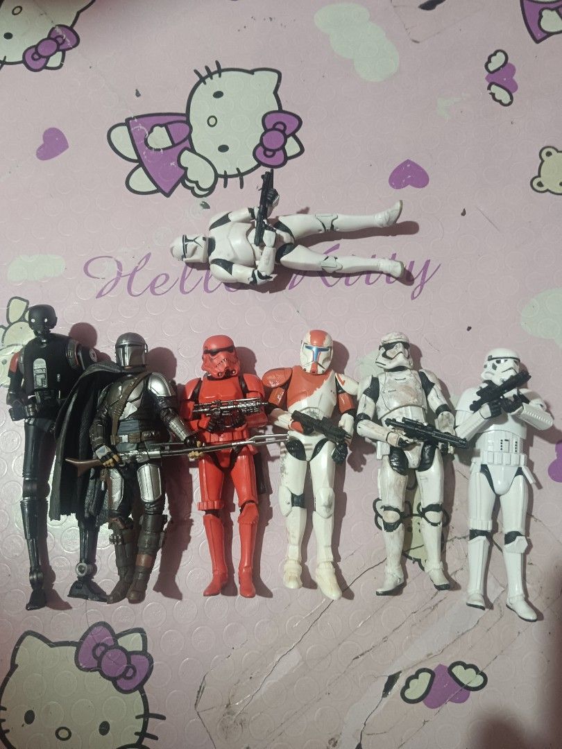 Starwars black series (Category: Action & Battle Toys) located in Pasig City. Submitted by rednaxela_rich (Listing ID 1467373863, Image 1). Description: 6pcs starwars black series set as is -2pcs 6" starwars stormtroopers as is -6" commando leader RC-1138 boss as is -6" jedi survivor kx security droid as is -6" crimson stormtrooper as is -6"TM-01 Beskar Mandalorian -6" stormtrooper no markings freebies ₱3000.