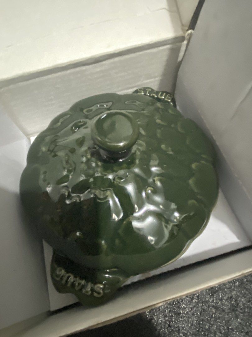 Staub Ceramic Artichoke Cocotte Green (Basil Green) (Category: Cookware & Accessories) located in San Juan City. Submitted by fastturtle_d9ad50 (Listing ID 1467476148, Image 2). Description: Staub Ceramic Artichoke Cocotte Green (Basil Green) - Authentic Staub miniature ceramic cocotte - Charming green artichoke design with detailed lid and matching bowl base - Embossed branding on handles and bottom - Perfect for individual dips, side dishes, or