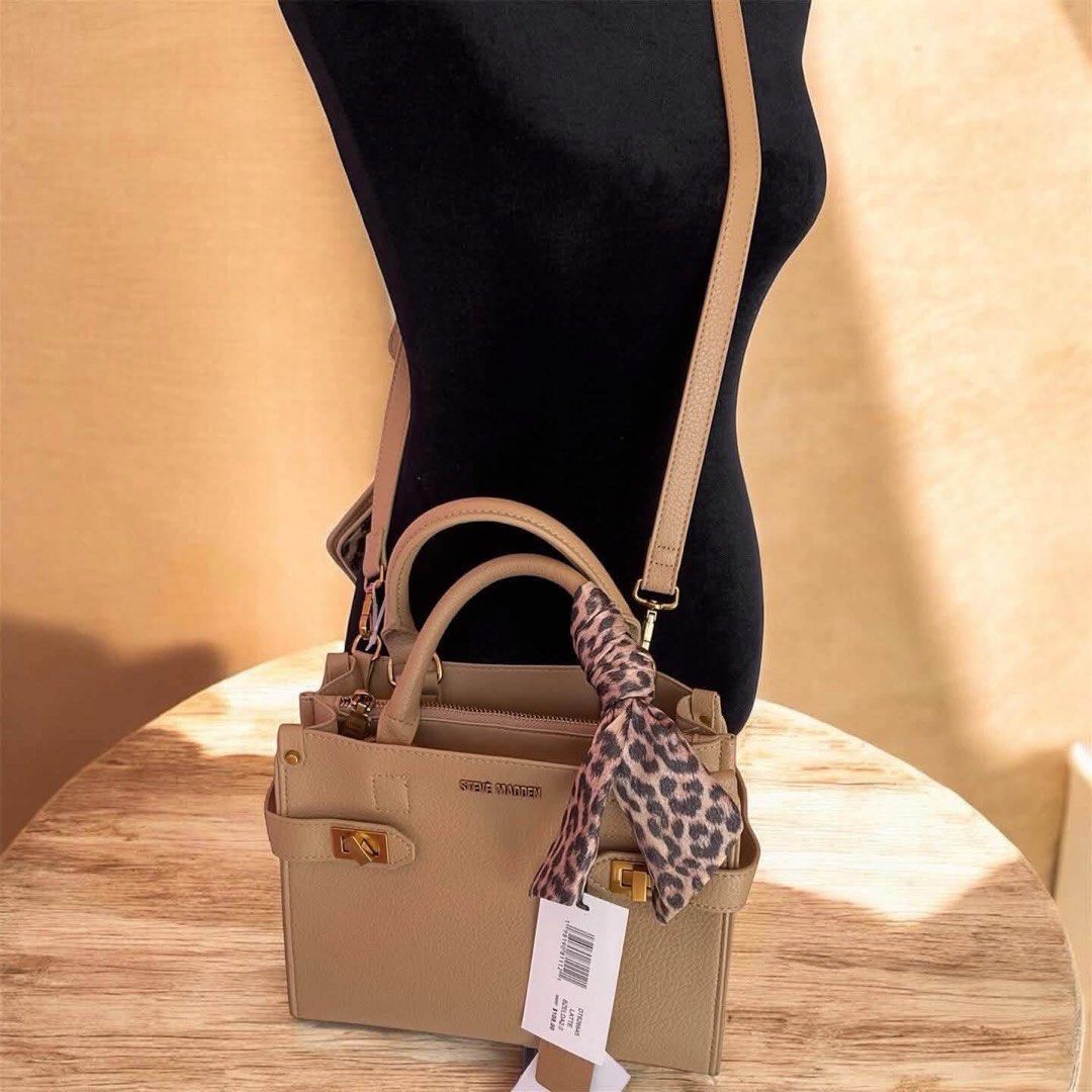 STEVE MADDEN BZELDA SCARF SATCHEL (Category: Cross-body Bags) located in Lapu Lapu. Submitted by glamorouslybeautiful8.0 (Listing ID 1467527469, Image 2). Description: ☘️👜♥️S T E V E • M A D D E N Bzelda Scarf Satchel crossbody with purse unused whooaahhh sassy, spacious and gorgeous piece‼️ Small (fits long wallet, cp, kikay kit..) 3 compartments silver tone hardwares detachable sling strap flaws: very minimal rubs on rubber sealant as shown ye