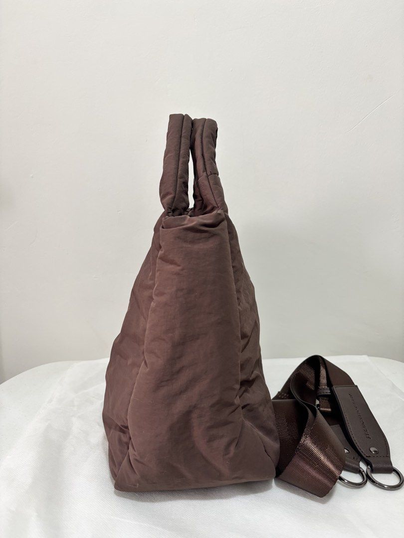 Straightforward Vesper Sling Bag - Chestnut (Category: Tote Bags) located in Taguig. Submitted by yumi9121 (Listing ID 1467400245, Image 3). Description: Like new! 10/10 condition RFS: Rarely used - Material: DryTech fabric that is durable, lightweight and water resistant - Closure: Secure magnetic top closure - Interior: Roomy divided compartments with lining, zip and slip pockets - Strap: Includes a matching adjustable shoulder strap with brand