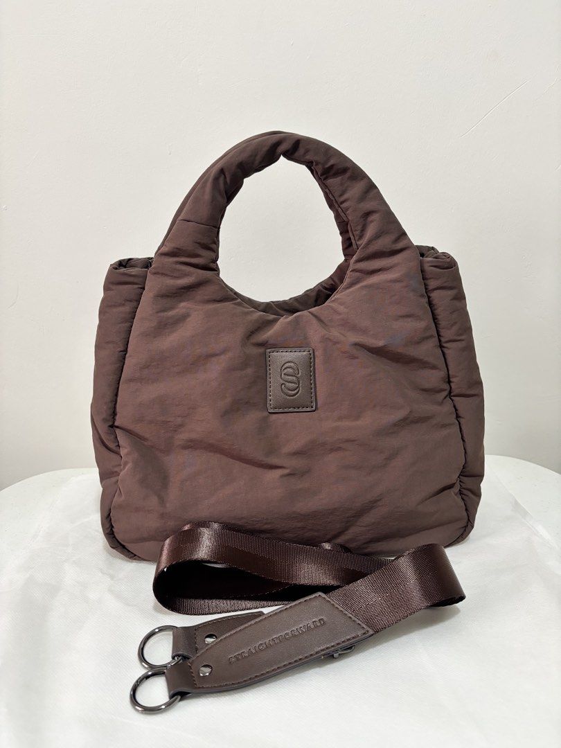 Straightforward Vesper Sling Bag - Chestnut (Category: Tote Bags) located in Taguig. Submitted by yumi9121 (Listing ID 1467400245, Image 1). Description: Like new! 10/10 condition RFS: Rarely used - Material: DryTech fabric that is durable, lightweight and water resistant - Closure: Secure magnetic top closure - Interior: Roomy divided compartments with lining, zip and slip pockets - Strap: Includes a matching adjustable shoulder strap with brand