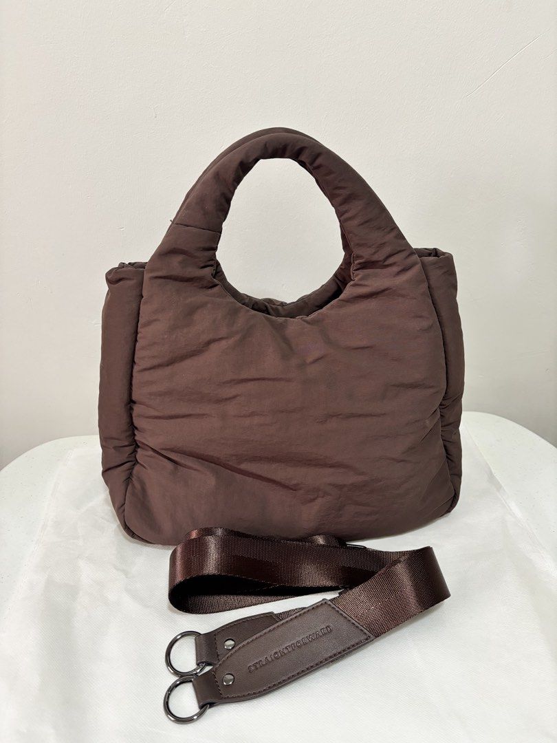 Straightforward Vesper Sling Bag - Chestnut (Category: Tote Bags) located in Taguig. Submitted by yumi9121 (Listing ID 1467400245, Image 2). Description: Like new! 10/10 condition RFS: Rarely used - Material: DryTech fabric that is durable, lightweight and water resistant - Closure: Secure magnetic top closure - Interior: Roomy divided compartments with lining, zip and slip pockets - Strap: Includes a matching adjustable shoulder strap with brand