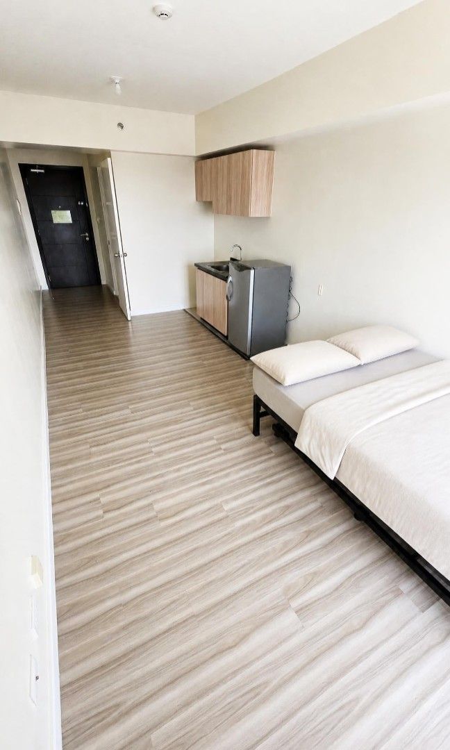 Studio | 11F | Vireo Arca South (Category: Apartments & Condos) located in Manila. Submitted by b.on.a.budget (Listing ID 1467575970, Image 2). Description: Move-in ready studio unit with great natural light and good view of the city skyline, and easy access to the future high street retail/park leading up to the mall.✨️ Just across Healthyway hospital; Walking distance to Arca South mall, Landers, SM Hypermart VIREO Tower 2, 11th floor, facing N