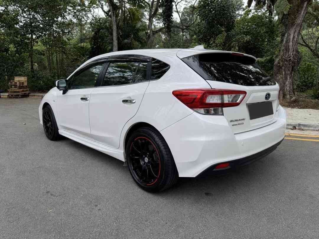 Subaru Impreza 5D 1.6i-S (A) (Category: Used Cars) located in Singapore. Submitted by carousell_certified_partners (Listing ID 1462862865, Image 2). Description: Beautiful White On Black Hatchback With Sunroof Edition! Good condition! 100% full loan available! 100% PHV loan available! Cheapest and lowest depreciation in the market! 1 of only 6 dealers in Singapore to be awarded roll of honor by SGCM! Buy with confidence! In-house loan or bank loa
