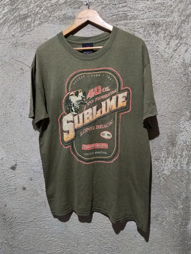 Sublime 40 Oz to freedom (Category: Activewear) located in Agoo. Submitted by district2vintage (Listing ID 1467594952, Image 1). Description: sublime - Zion - Large - 22x30 - Cracks 1 Stick hole on Mid part.