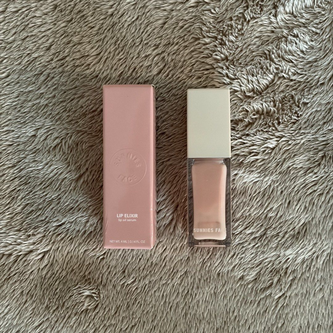 Sunnies Face Lip Elixir (Category: Makeup) located in San Juan City. Submitted by _ands_ (Listing ID 1467457650, Image 1). Description: - Shade: Strawberry Milk - Around 50% of product remaining.