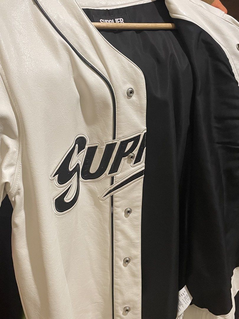 SUPPLIER Leather Baseball Shirt (Category: Vests) located in Pasig City. Submitted by thriftline.ph (Listing ID 1467428743, Image 3). Description: SUPPLIER Leather Baseball Shirt Width : 21 Length : 27 - White ( 9.9/10 Colorate ) ✨ Issue see in the photo - As New Condition Price : 2500 📥.