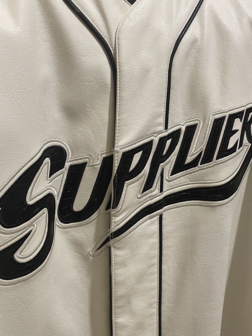 SUPPLIER Leather Baseball Shirt (Category: Vests) located in Pasig City. Submitted by thriftline.ph (Listing ID 1467428743, Image 2). Description: SUPPLIER Leather Baseball Shirt Width : 21 Length : 27 - White ( 9.9/10 Colorate ) ✨ Issue see in the photo - As New Condition Price : 2500 📥.