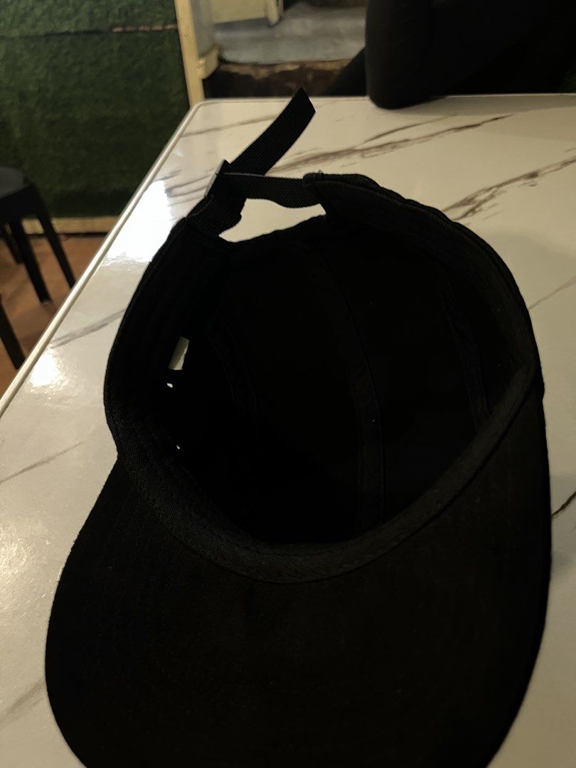 Supreme Black 5-Panel Camp Cap (Category: Caps & Hats) located in Impasugong. Submitted by luisterpicks (Listing ID 1467485745, Image 3). Description: - Authentic black Supreme camp cap - Iconic white embroidered box logo on front - Adjustable strapback closure with branded plastic buckle - Clean condition with minimal signs of wear - Perfect for daily streetwear and casual fits.