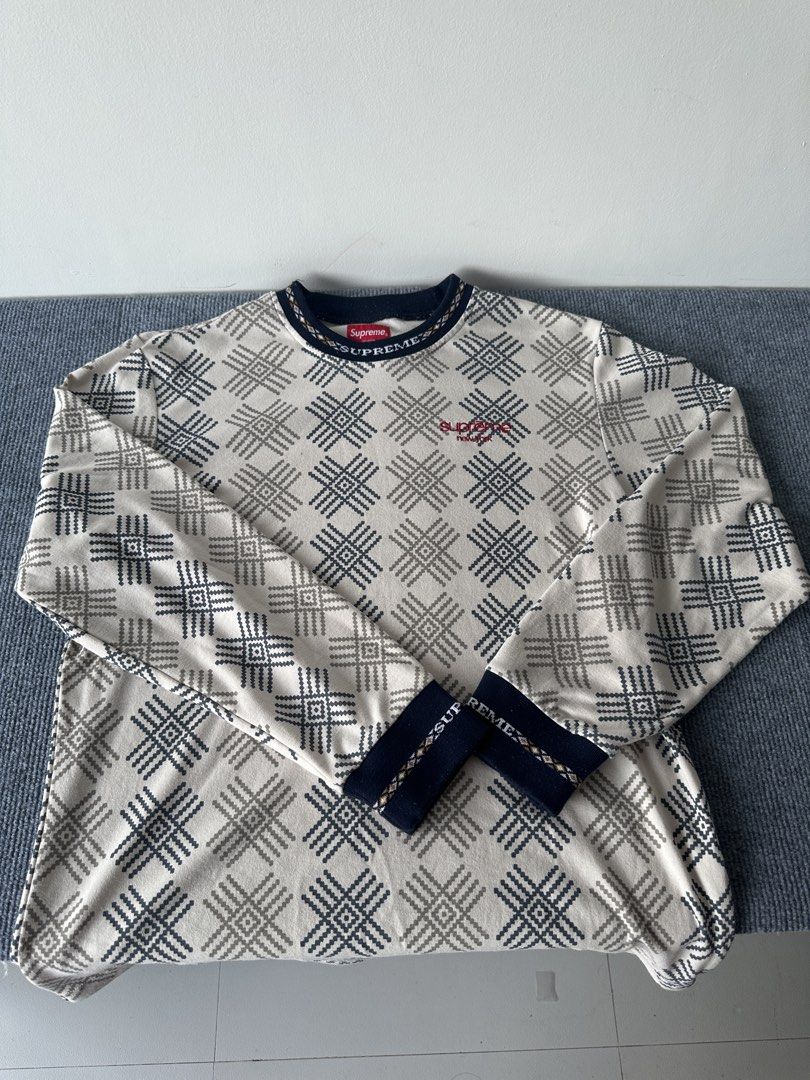 Supreme 18fw Patterned Long Sleeve Tee (Category: Tshirts & Polo Shirts ) located in Manila. Submitted by andy0729 (Listing ID 1467445813, Image 2). Description: Authentic - Brand: Supreme - Style: Long sleeve shirt with dark blue and grey geometric pattern - Color: Cream - Size: Small - Details: Red Supreme box logo at collar, small embroidered Supreme New York text on chest, ribbed neck and cuffs with woven lettering and diamond details - Mater