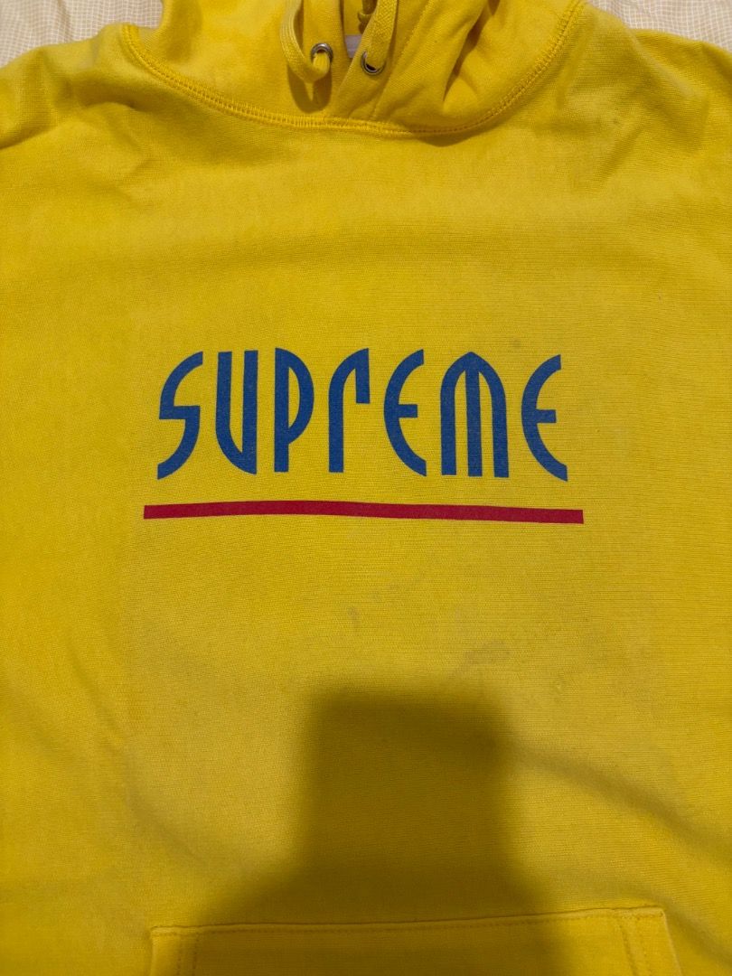 Supreme Yellow Hoodie Medium (Category: Hoodies) located in Marikina City. Submitted by zaxcheus_castillo1708 (Listing ID 1467575107, Image 2). Description: - Brand: Supreme - Color: Yellow with blue and red graphic print - Size: Medium (Standard fit) - Made in Canada - Material: Classic heavyweight cotton fleece - Features: Drawstring hood and front kangaroo pocket - Condition: Clean with original neck tags (RN and CA numbers) intact.