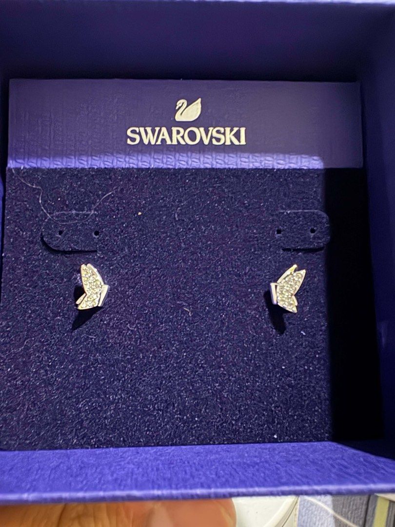 Swarovski Idyllia Lilia stud earrings (Category: Earrings) located in Bacoor. Submitted by michiepeachy (Listing ID 1467516886, Image 3). Description: - Brand: Swarovski - Model Number: 5636424 - Design: Pavé crystal butterfly studs - Finish: Rhodium plated - Condition: Brand new, never worn, clean and undamaged - Inclusions: Original blue box included - Perfect for gifting or daily wear.